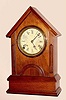 Kroeber Clock Co., "GOTHIC", walnut cased mantel clock, 8-day time and gong strike, C.1875