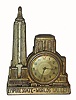 F. P. Dressler, NY (Novelty Co) , cast metal case of the Empire state building with a 30-hour lever movement timepiece. Bottom of the case is marked Dressler. Circa 1930