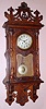 German, Oak Cased, Art Nouveau wall clock with nice rack strike, 8-day movement marked B and W, serial 60104, C.1920