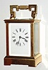 French, brass cased carriage clock, time and gong strike, in a square cornered "Anglaise" case, and with its original leather covered travel box. C.1900