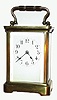 French, smaller brass cased carriage timepiece, with cylinder 'scape, in a plain Corniche case, porcelain dial with Arabic numerals. C.1900
