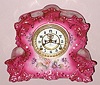 Ansonia Clock Co., REVIEW, in dark pink, porcelain china clock with open escapement dial, C.1900/