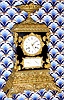 French, ormolu and slate double dial calendar clock, the dials set into a piece of ebonized walnut, and the sides of black slate, silk thread suspension, showing date and day of the week (in abbreviated French) C.1850
