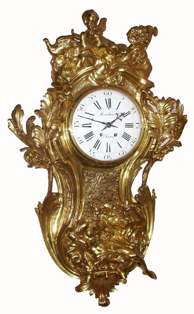 French, Martinot, Paris, very large ormolu cartel clock, the case surmounted by a cherub having spilled out of a chariot pulled by a swan, the bottom of the case showing a reclining Zeus with an eagle at his side, 8-day, time and strike. — Antique Clocks Price Guide