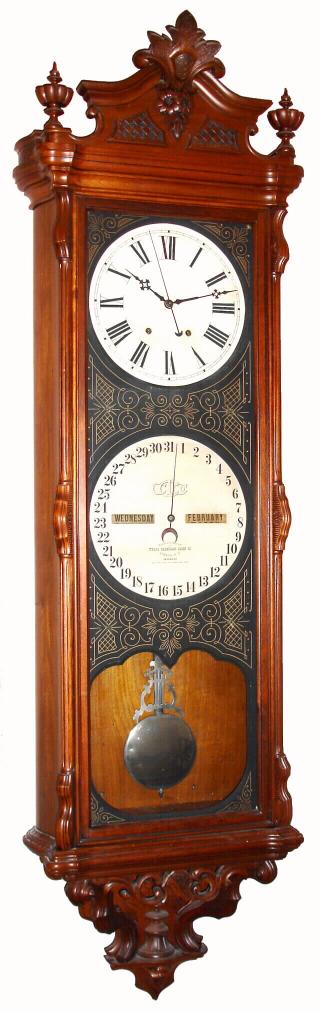 Ithaca Calendar Clock Co, NY, "REGULATOR No. 1", double dial perpetual wall calendar, 2-wt, 8-day. This clock hung in the Millbury Savings Bank (Established 1854 in Millbury, Mass). It was removed when the bank went electric around 1935, and taken home by the janitor, and stored under his bed for decades. Upon his death, his son sold the clock to the current consignor. Attest included. — Antique Clocks Price Guide