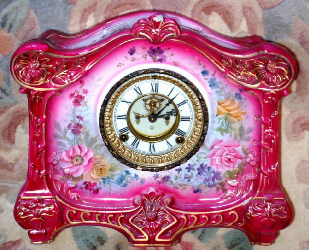 Ansonia Clock Co., C.1914, Royal Bonn, "LA PALMA" porcelain china cased clock, with 8-day, gong strike mov't with open escapement on porcelain dial. — Antique Clocks Price Guide