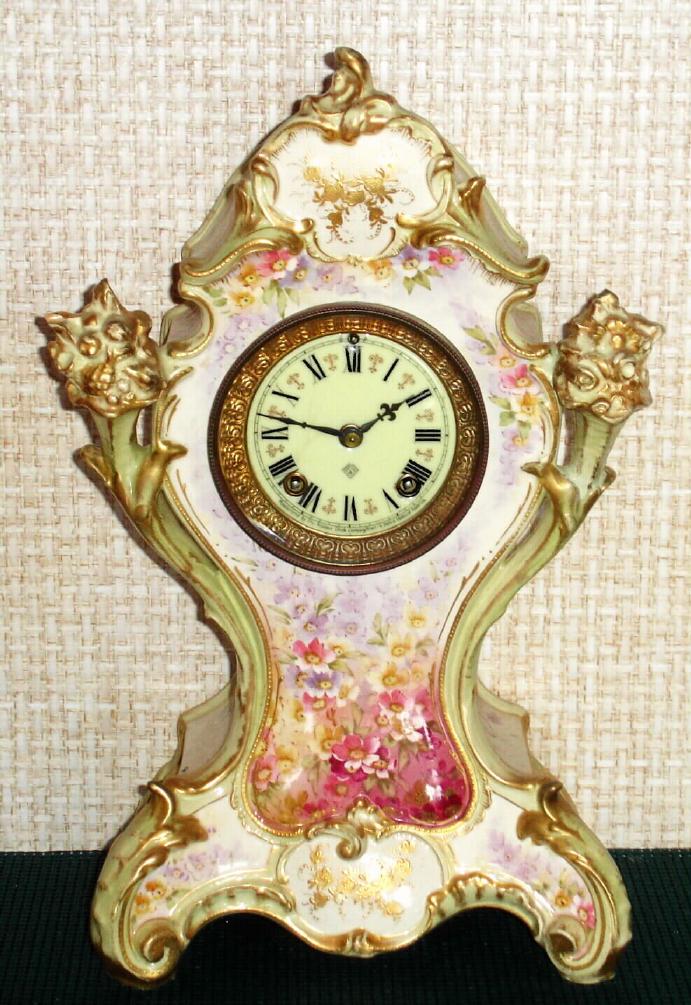 Ansonia Clock Co., C.1895, unknown model Royal Bonn, classic French style with dial flanked by cornucopia, filled with flowers and fruit, 8-day time and strike. — Antique Clocks Price Guide