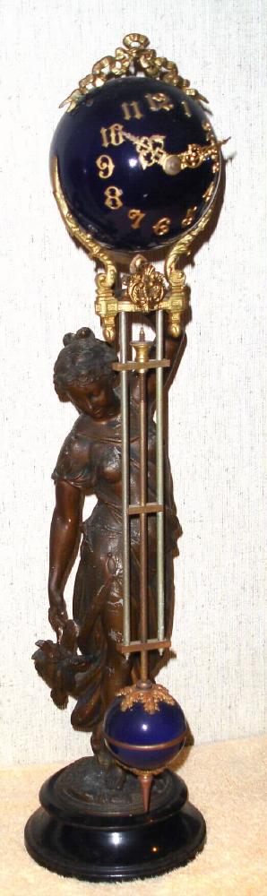 Ansonia Clock Co. New York, C.1895, "HUNTRESS" swinging arm timepiece, 8-day, the movement contained within the ball at top. — Antique Clocks Price Guide