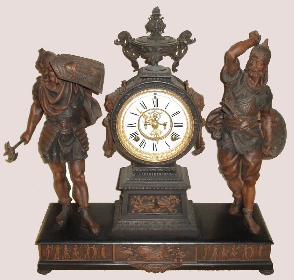 Ansonia Clock Co., New York, C.1894, "COMBATANTS" double statue figural clock [rare model], with open escapement on porcelain dial, gong striking, 8-day. — Antique Clocks Price Guide