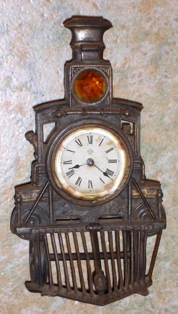 Ansonia Clock Co., New York, Locomotive "No. 44" novelty clock, 1-day time, rear wind/set — Antique Clocks Price Guide
