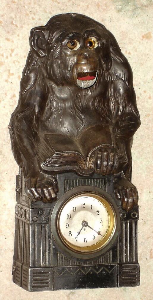 German, Junghans, MONKEY AUTOMATON, his eyes move up and down as his mouth opens farther/farther and then closes. 1-day time movement. — Antique Clocks Price Guide