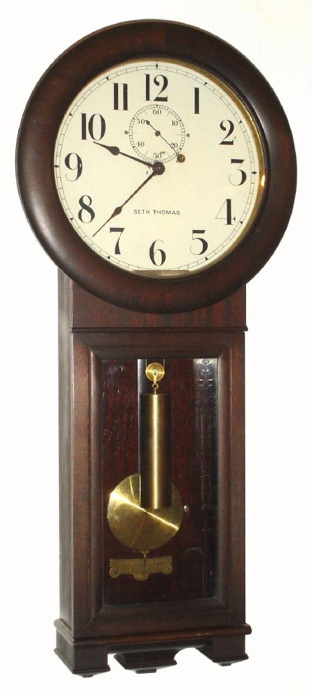 Seth Thomas Clock Co., "Regulator No. 2", Circa 1900, 8-day mahogany wall timepiece, with large 77B movement with dead beat escapement and maintaining power. — Antique Clocks Price Guide