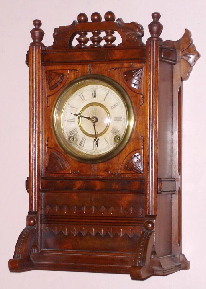 Waterbury Clock Co., "Cabinet E", Circa 1887, 8-day time/strike mantel clock. — Antique Clocks Price Guide