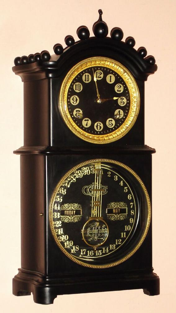 Ithaca Calendar Clock Co., "No. 15 Melrose", Circa 1880, 8-day time/strike ebonized case double dial calendar mantel clock, a hard to find model. — Antique Clocks Price Guide