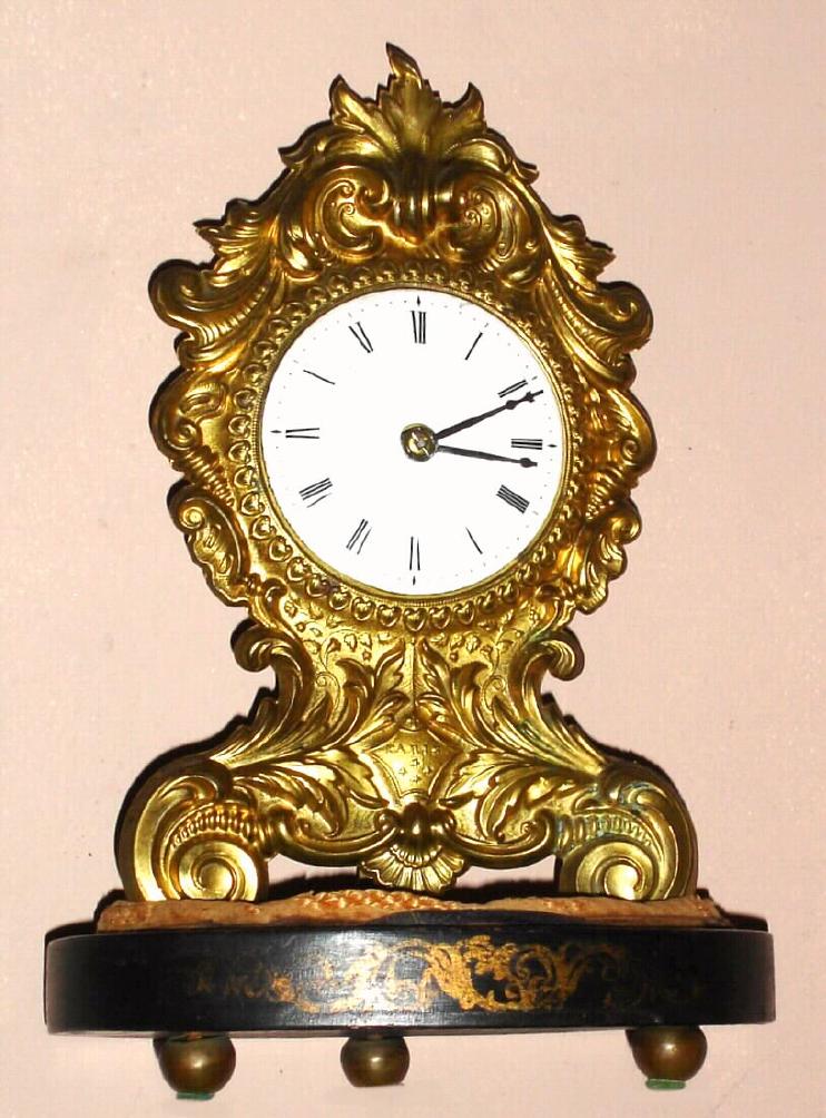 Chauncey Jerome, New Haven, Conn, C.1850, brass repoussse "Paris" model shelf clock with 1-day Botsford patent movement, and original glass dome. — Antique Clocks Price Guide