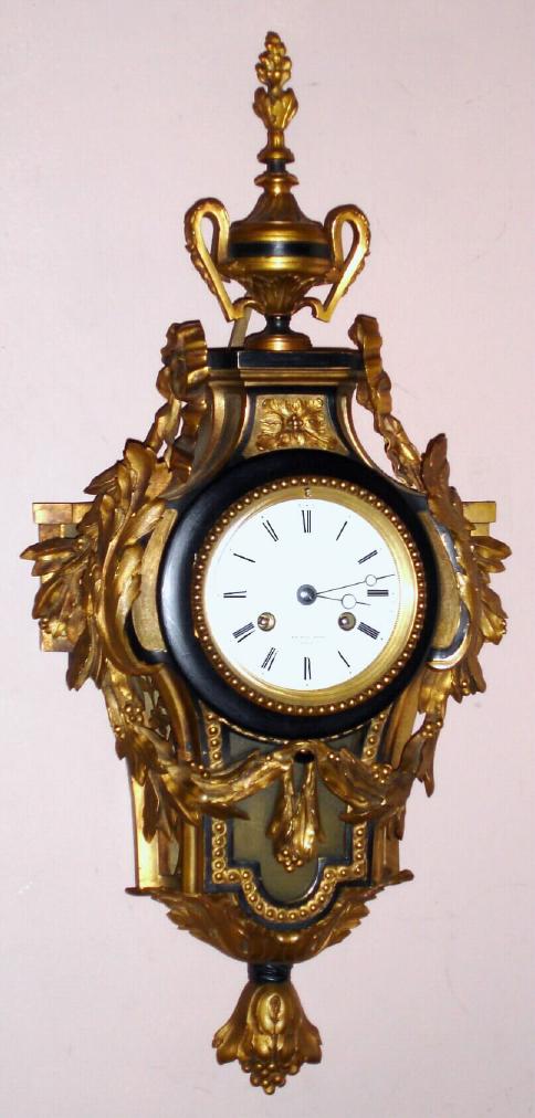 Raingo Freres, Paris, Louis XVI style CARTEL wall clock in a bronze and dore case, C.1850, signed Raingo on the dial and the movement, bell striking, 8-day+. The case with acanthus sprays and swags, surmounted by a finial. — Antique Clocks Price Guide