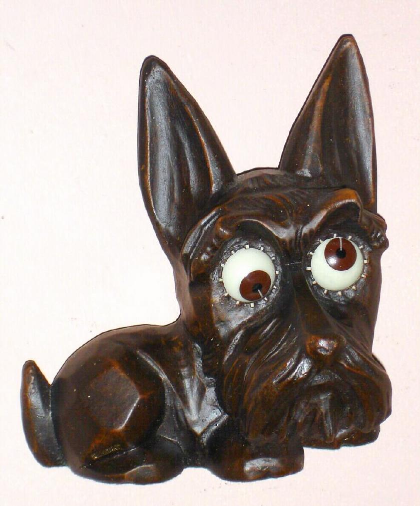 German, Oswald Uhrenfabrik, C.1955, SCOTTY dog clock, with rotating eyes, 1-day, in a cast, composition case. — Antique Clocks Price Guide