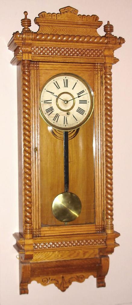 Ansonia Clock Company, New York, "QUEEN CHARLOTTE" oak cased, 8-day timepiece, spring. — Antique Clocks Price Guide