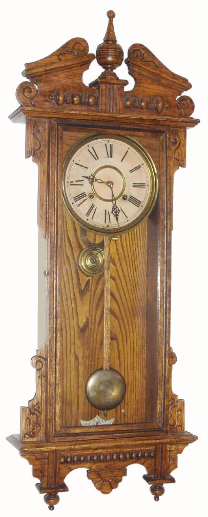 Waterbury Clock Co., C.1905, "ELTON" model, oak cased wall clock, 8-day, time and gong strike, spring, and with fancy pierced hands. — Antique Clocks Price Guide