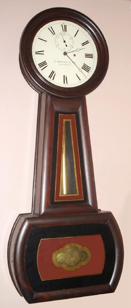 E. Howard and Co., Boston, C.1900, "No. 1 BANJO", in a rosewood grained cherry case, full regulator size with seconds beating pendulum. — Antique Clocks Price Guide