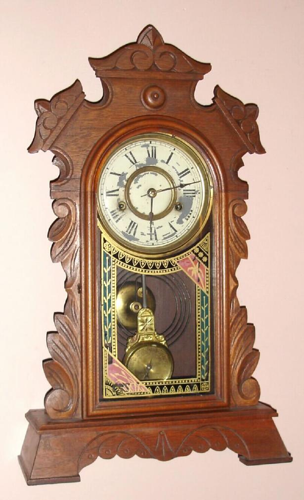 New Haven Clock Co, New Haven Conn "TIBER" model 30 hour time and strike spring driven mvt in walnut case with gilt pan 5 1/2" Roman numeral dial, c1880 — Antique Clocks Price Guide
