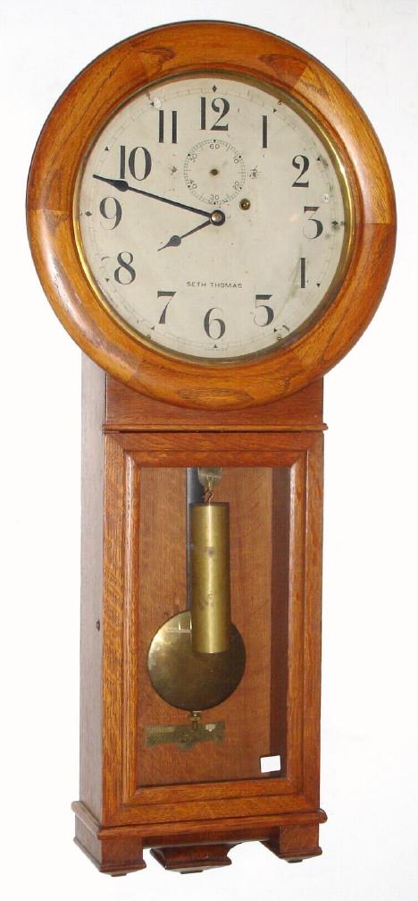 Seth Thomas Clock Co., Regulator No. 2, C.1920, in an oak case, 8-day, weight driven. — Antique Clocks Price Guide