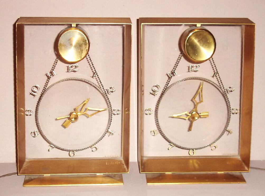(2) Jefferson Electric Company, Bellwood Ill. "GOLDEN SUSPENSE" model electric mystery clocks. Ht 13" — Antique Clocks Price Guide