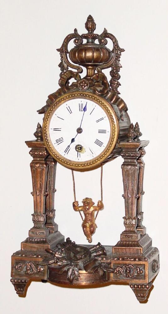 French, Farcot, Swinging Doll novelty timepiece, in a patinated spelter case, C.1890, doll or cherub "pendulum" swings from front to back. — Antique Clocks Price Guide