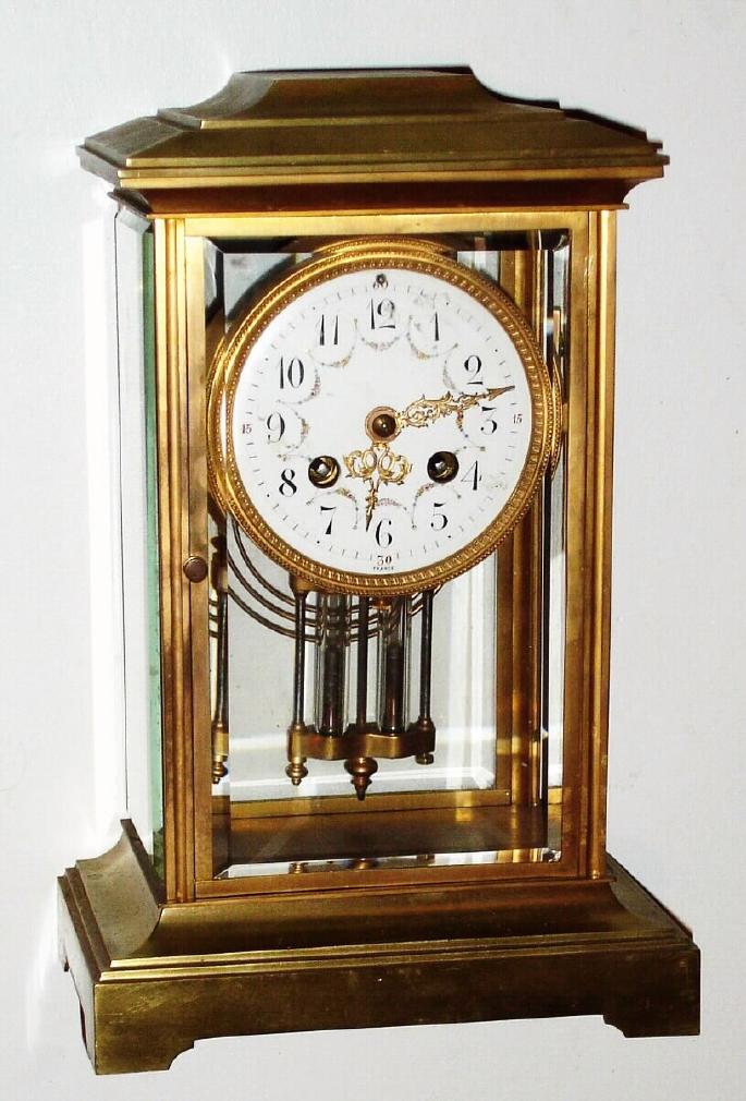 French, Samuel Marti for Bailey Banks and Biddle, Philadelphia PA, C.1913, Brass crystal regulator with 8-day time and strike mvmt and 2-glass vial pendulum. — Antique Clocks Price Guide