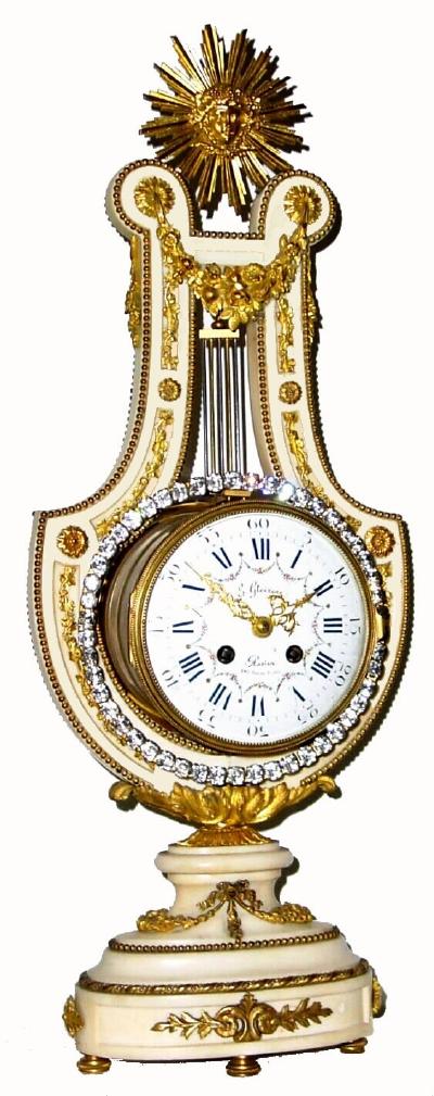 French, Marti et Cie, LYRE FORM Clock, c.1890, with a ring of brilliants attached to the pendulum, and which swing from side to side. — Antique Clocks Price Guide