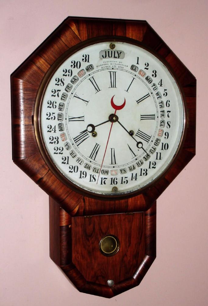 Gilbert Mfg Co., Winsted, Conn, GALUSHA MARANVILLE, patent calendar on their short drop octagon in rosewood, 8-day time and strike, C.1862, manufactured for N. C. HYDE and CO {as shown on label}. — Antique Clocks Price Guide