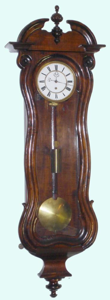 Austrian, "Vienna Regulator" one-wt timepiece, in a serpentine wall case, C.1860. — Antique Clocks Price Guide