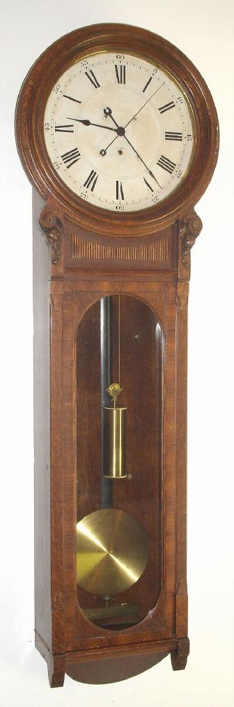 Seth Thomas Clock Co., "REGULATOR No. 60", in oak, 8-day weight driven, using the same heavy movement as installed in the No. 16 and No. 19 Sweep Seconds regulators, c.1886 — Antique Clocks Price Guide