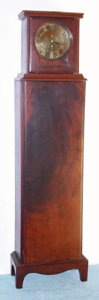 Dwarf tall case, reproduction of the Nathaniel Mulliken style, using a Seth Thomas No. 2 movement, a nicely made country style mahogany case with dovetail construction. — Antique Clocks Price Guide