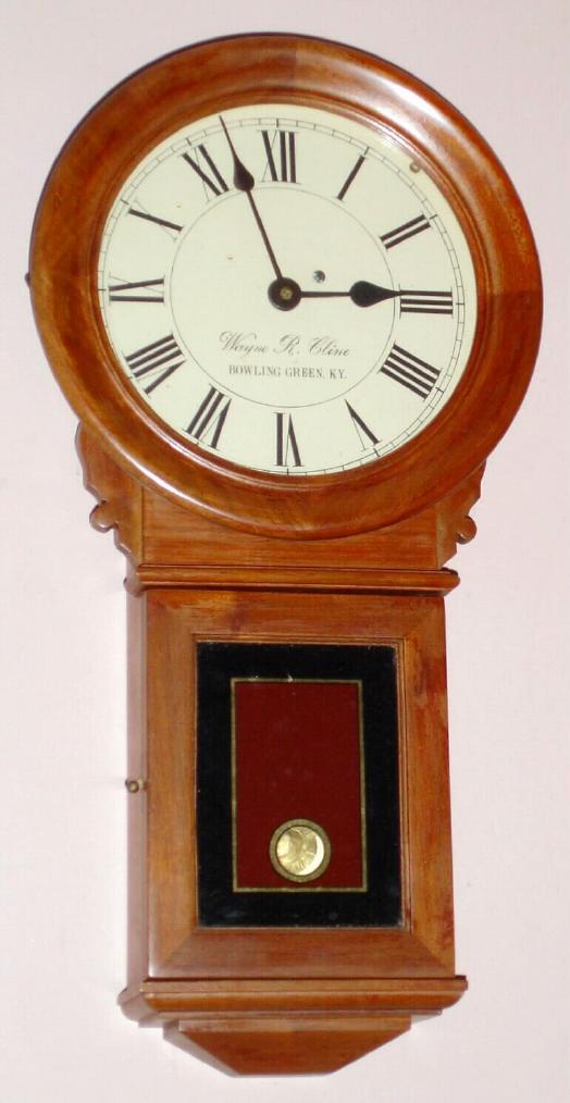 Wayne R. Cline, Bowling Green, KY, Circa 1996, 8-day miniature of a Howard no. 70 wall timepiece. The late Mr. Cline made miniature versions of Howard wall and banjo clocks and used Waltham car clock movements to power them. — Antique Clocks Price Guide
