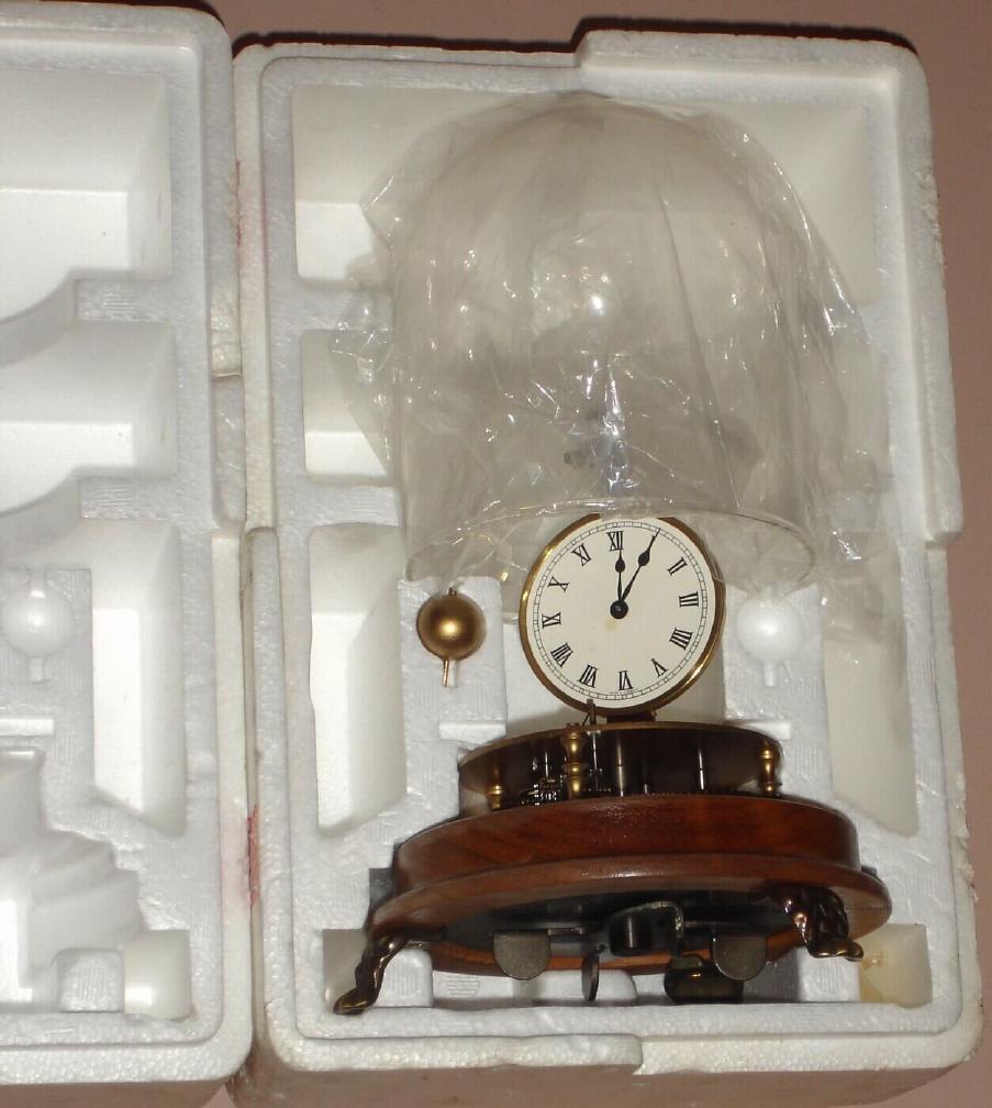 German, for Charles Terwilliger/ Horolovar Co., Bronxville, NY, Circa 1975, repro Briggs Rotary 8-day novelty timepiece under a dome. — Antique Clocks Price Guide