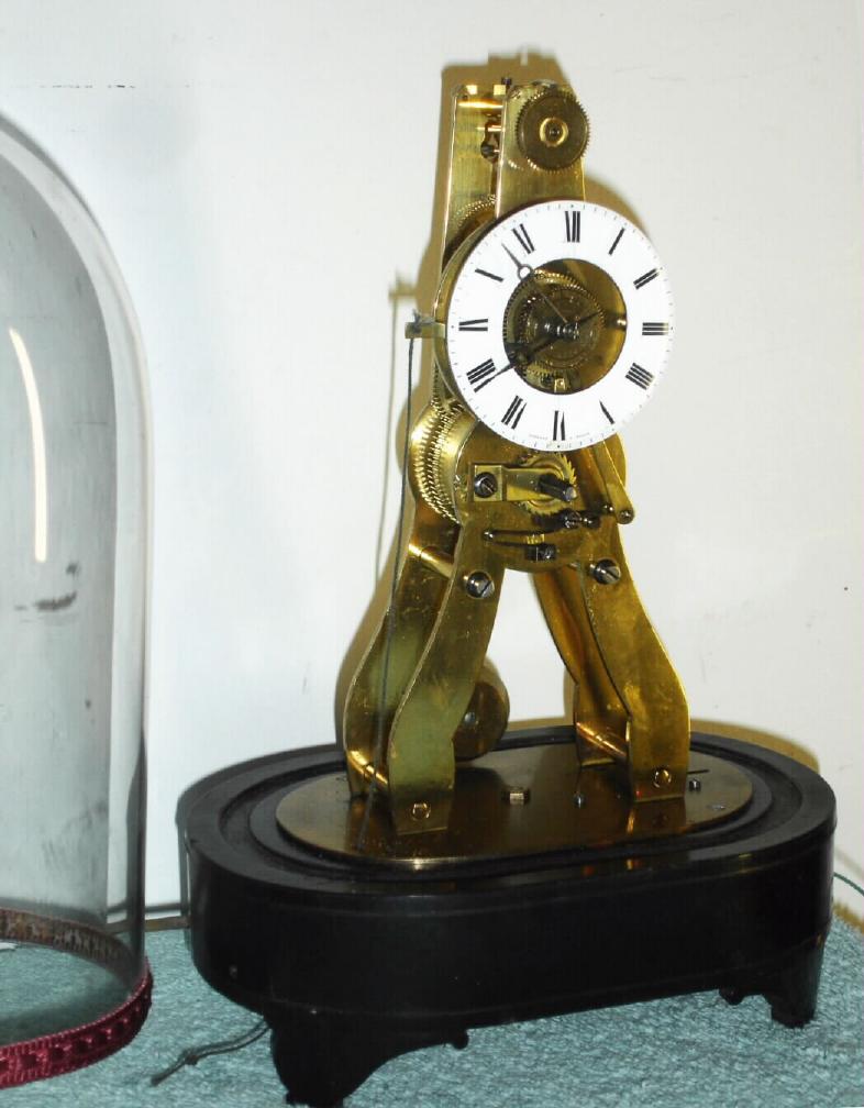 French, for the English market, time and alarm mini skeleton clock, sold at the Great Exhibition of 1851, this one signed on the dial and movement: Pierret, a'Paris, and with a damaged dome. Plates are smooth on this model; see another clock in sale that is engraved. — Antique Clocks Price Guide