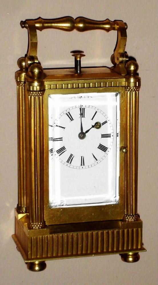 Swiss, carriage clock, miniature quarter hour repeater movement in Empire style polshed brass case with Roman numeral porcelain dial, c1900 — Antique Clocks Price Guide