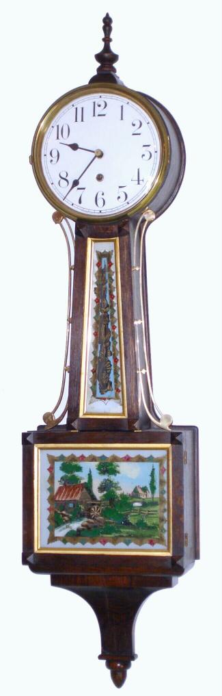 Waterbury Clock Co., "WILLARD No. 4" banjo timepiece in Flemish oak, with cabin and waterwheel tablet set. Note, at the factory, workers mis-labeled this as a Willard No. 5, which was made only of mahogany and with a different tablet set. — Antique Clocks Price Guide