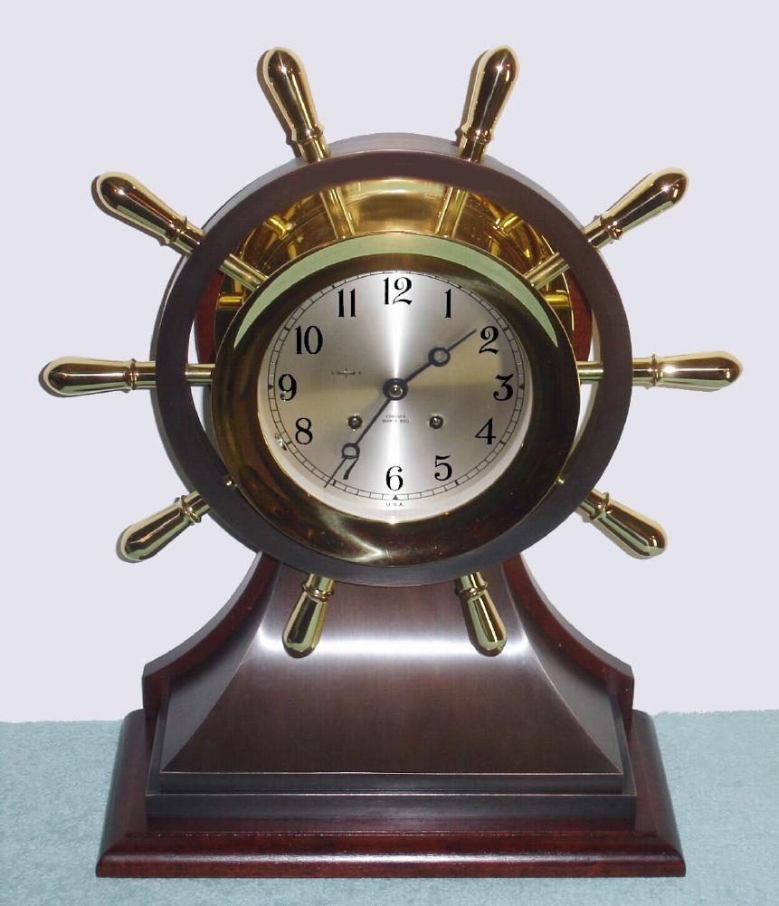 Chelsea Clock Co., No. 2003M, MARINER, Ship's bell clock, 6" dial, on base in gift box, as-new; tu-tone finish, yellow brass and bronze, C.2005. — Antique Clocks Price Guide