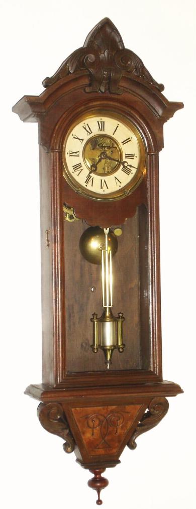 F. Kroeber Clock co., NY, hard to find REGULATOR No. 31 in a walnut case with carved trim, 8-day time and bell strike, and complete label on rear. — Antique Clocks Price Guide