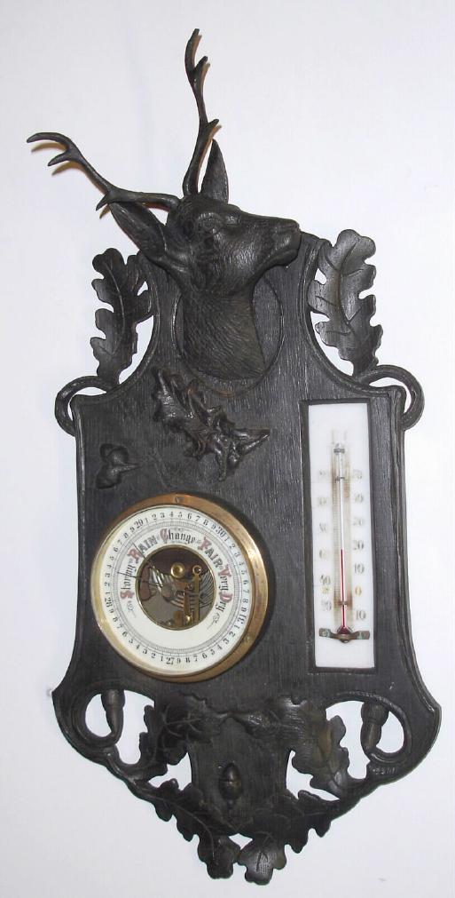 German, carved Black Forest barometer and thermometer set on a wall mount with carved stag's head and foliage, C.1880 — Antique Clocks Price Guide