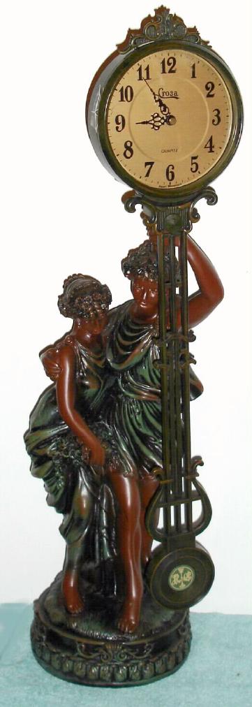 "Crosa" brand, modern Swinger, plastic molded figure with quartz movement, C.1998. — Antique Clocks Price Guide
