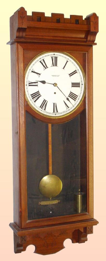 New Haven Clock Co., C.1885, "Standard Time No. 9", walnut cased weight regulator, 8-day time, case style with Eastlake influence. — Antique Clocks Price Guide