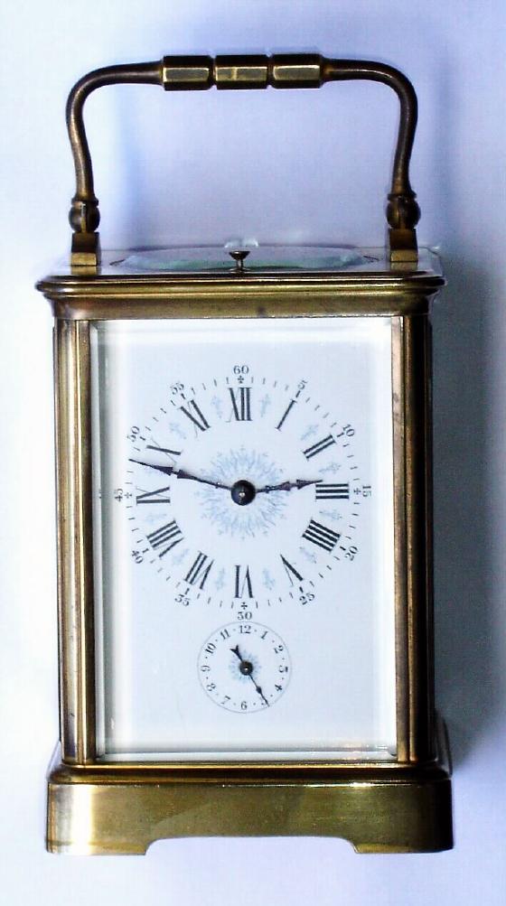 French, brass cased Carriage Clock, c.1900, GRAND SONNERIE, with slector in base for Pte Sonnerie, Silence and Gde Sonnerie, and with alarm and repeat. Fancy dial with black numerasl and blue decorations. — Antique Clocks Price Guide
