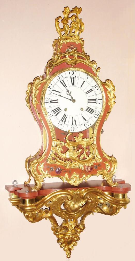 French, unsigned, very large Rococo style bracket clock with bracket, finished in Vernis Martin {or Martin Varnish}, C.1900. This clock is made in the style of the mid 1700s, and is a high quality version of an original. It has a well made Brocot escapement, and except for the suspension, the movement replicates an 18th century mov't in size and external appearance, even including a star spoked count wheel. Lacquer finish on furniture was brought to vogue by the Martin brothers in Paris in the early 1700s and has had periods of interest since then. The dial is 11.5 inches in diameter, and consists of 13 porcelain pieces attached to a brass backing. — Antique Clocks Price Guide