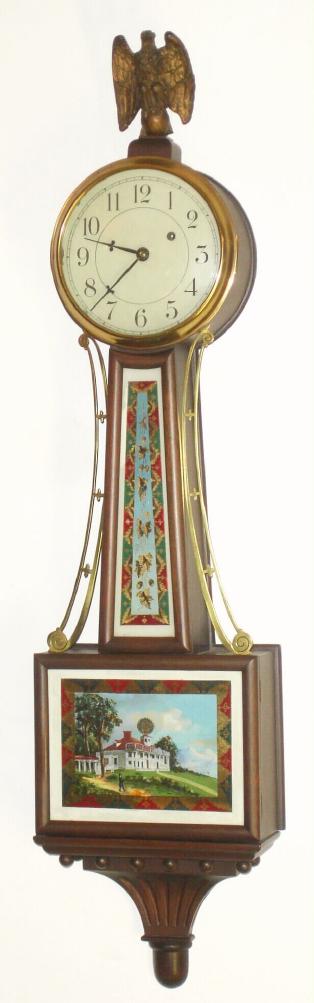 Herschede Clock Co., Cincinnati, (Ohio), C.1921, mahogany cased banjo timepiece, serial No. 7567, with a set of Mt. Vernon tablets. Special Herschede movement with maintaining power and Geneva style winding stop, also Graham's style dead-beat escapement. — Antique Clocks Price Guide