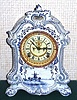 Ansonia Clock Co., C.1895, Royal Bonn, "No. 501" porcelain china cased clock, with 8-day, gong strike mov't with open escapement on porcelain dial, and the case in blue Delft pattern.