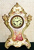 Ansonia Clock Co., C.1895, unknown model Royal Bonn, classic French style with dial flanked by cornucopia, filled with flowers and fruit, 8-day time and strike.