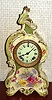 Ansonia Clock Co., C.1895, Royal Bonn, "LA CAPELLE" porcelain china cased clock, with 8-day, gong strike mov't, as-found. Colors are light yellow and muted green with bright floral accents and fancy dial.